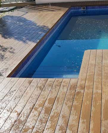 tarima exterior sintetica encapsulada Deckron TECA en piscina
